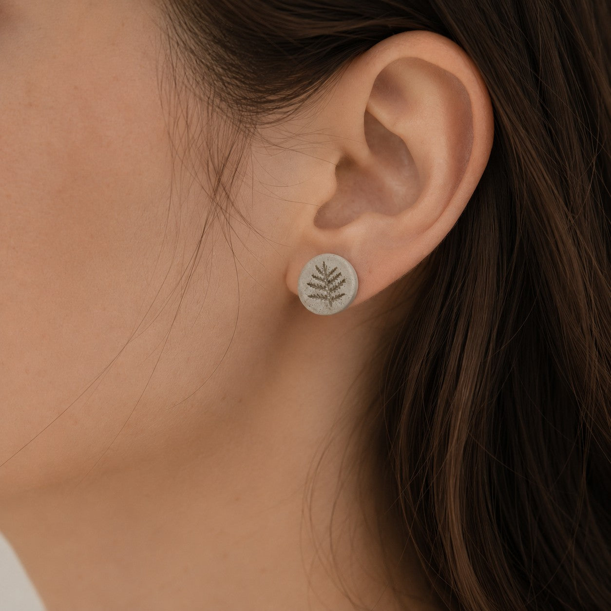 Jurassic Flora Stud Earrings worn on ear