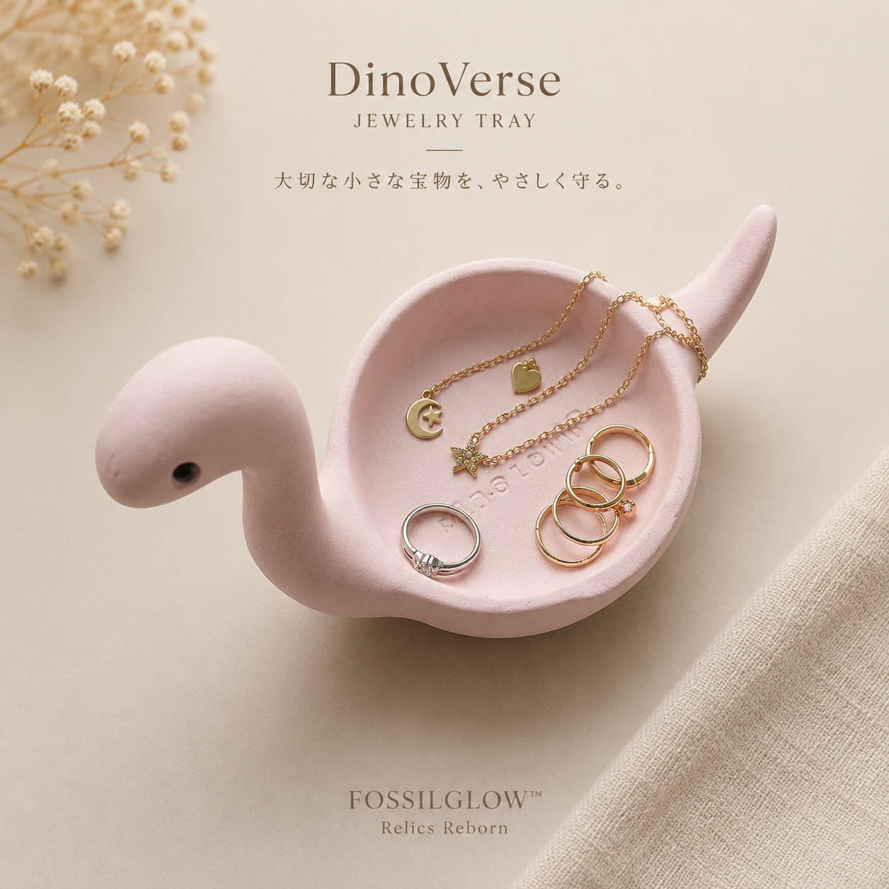 Top-down view of Bronto Jewelry Tray on a wooden surface, scattered rings and chain, brand typography
